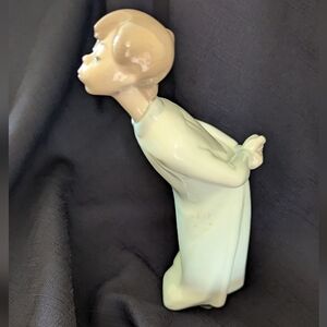 Lladro " Boy Blowing" #4869 Mint Condition